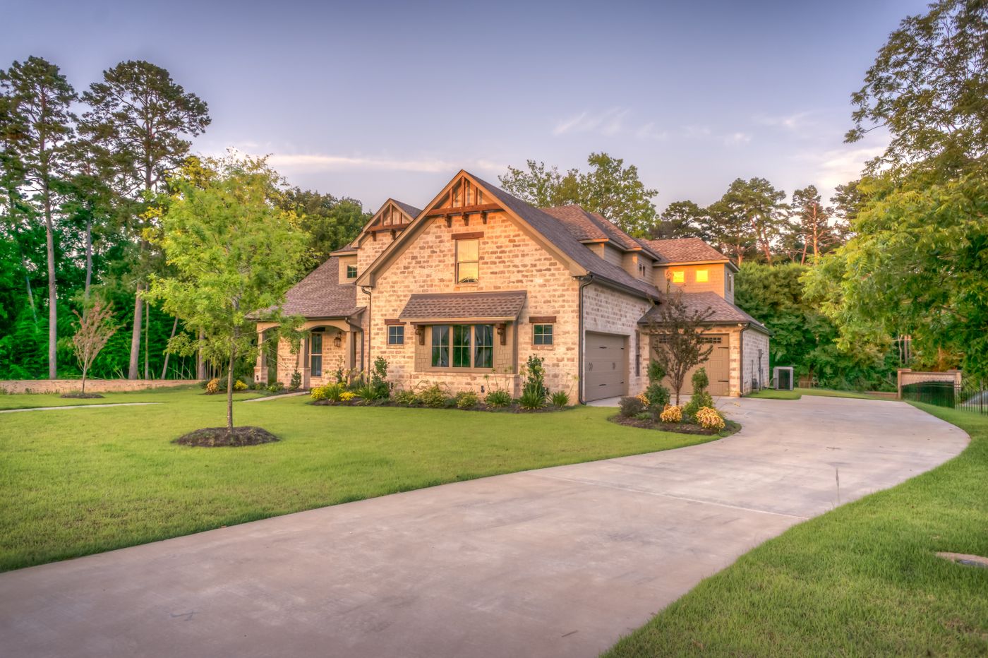 Suburban home at dusk — review home insurance before renewal